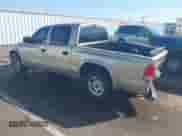2004 Dodge Dakota SLT with VIN 1D7HL48N44S504617, listed as a IAAI auction lot 41955400 with 196,096 mi miles and . Bid and sale history available at DreamBid. Image 3.