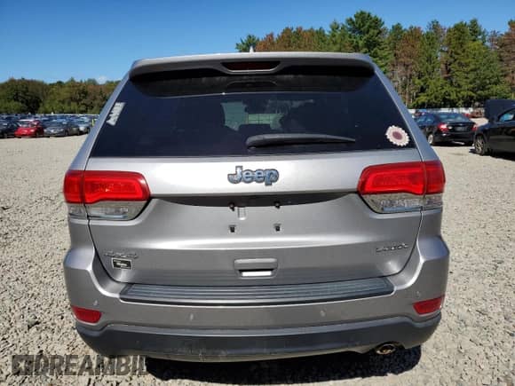 2018 Jeep Grand Cherokee Laredo with VIN 1C4RJFAGXJC484620, listed as a Copart auction lot 81606765 with 97,097 mi miles and Salvage title. Bid and sale history available at DreamBid. Image 6.