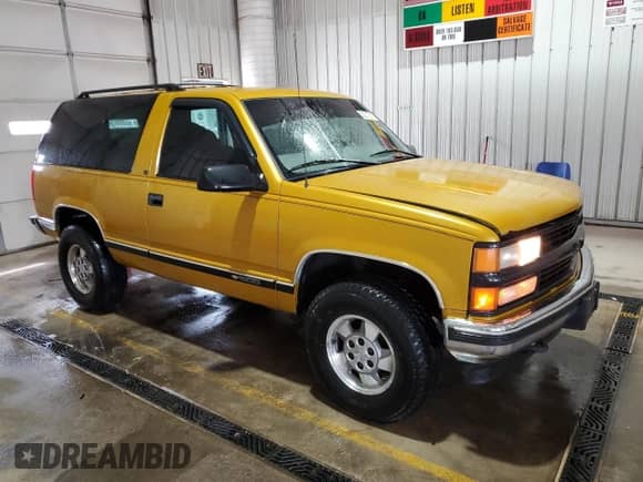 1997 Chevrolet Tahoe z VIN 3GNEK18R1VG104628, wystawiony jako Copart lot #53315215 z przebiegiem 195 743 mil mil oraz Szkoda całkowita • Salvage title. Historia ofert i sprzedaży dostępna na DreamBid. Obrazek 4.