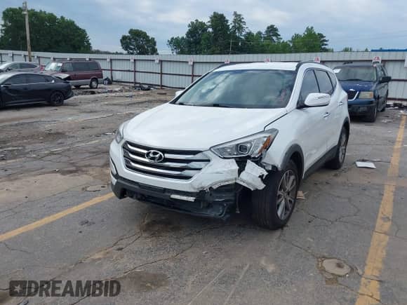 2014 Hyundai Santa Fe with VIN 5XYZUDLA3EG224775, listed as a IAAI auction lot 42606053 with 150,000 mi miles and . Bid and sale history available at DreamBid. Image 2.