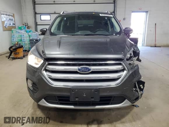 2017 Ford Escape Titanium with VIN 1FMCU9J92HUB60786, listed as a Copart auction lot 81855945 with 145,530 mi miles and Salvage title. Bid and sale history available at DreamBid. Image 5.