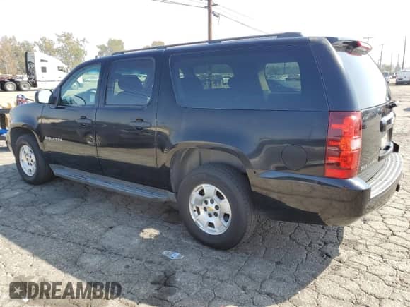2010 Chevrolet Suburban LS с VIN 1GNUCHE02AR239103, выставлен на аукционе Copart как лот 86162425 с пробегом 188 156 миль миль и Чистый • Clean title. История ставок и продаж доступна на DreamBid. Изображение 2.
