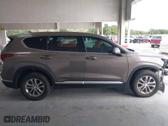 2019 Hyundai Santa Fe SEL с VIN 5NMS3CAD7KH078717, выставлен на аукционе IAAI как лот 43065754 с пробегом 78 510 миль миль и . История ставок и продаж доступна на DreamBid. Изображение 14.