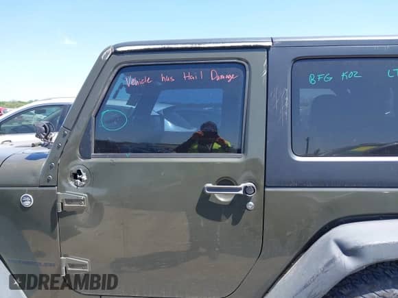 2015 Jeep Wrangler Sport with VIN 1C4AJWAGXFL650428, listed as a IAAI auction lot 42010629 with 80,039 mi miles and . Bid and sale history available at DreamBid. Image 14.