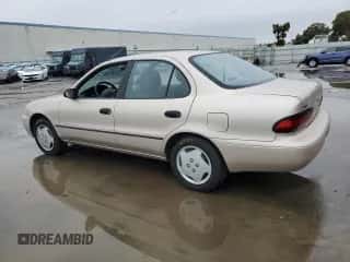 1994 Chevrolet Prizm z VIN 1Y1SK5380RZ037720, wystawiony jako Copart lot #85158504 z przebiegiem 110 637 mil mil oraz Szkoda całkowita • Salvage title. Historia ofert i sprzedaży dostępna na DreamBid. Obrazek 2.
