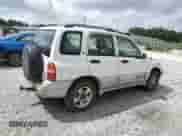 2002 Chevrolet Tracker LT with VIN 2CNBJ634126907949, listed as a Copart auction lot 61406895 with 218,423 mi miles and Clean title. Bid and sale history available at DreamBid. Image 3.