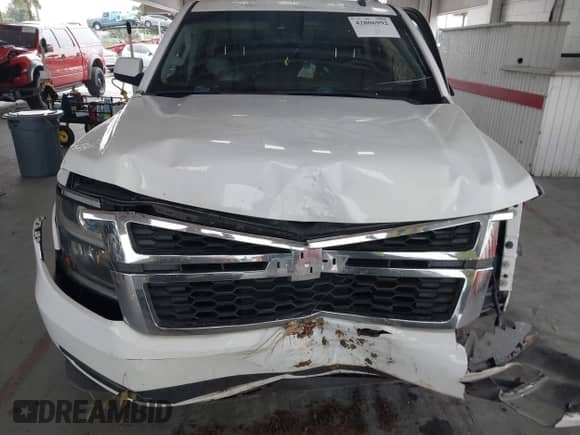 2015 Chevrolet Suburban LT with VIN 1GNSCJKC0FR104562, listed as a IAAI auction lot 42806992 with 178,433 mi miles and . Bid and sale history available at DreamBid. Image 13.