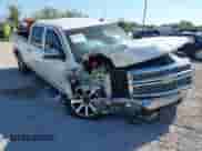 2014 Chevrolet Silverado 1500 LT z VIN 3GCUKREC0EG163253, wystawiony jako IAAI lot #43323568 z przebiegiem 144 178 mil mil oraz . Historia ofert i sprzedaży dostępna na DreamBid. Obrazek 1.