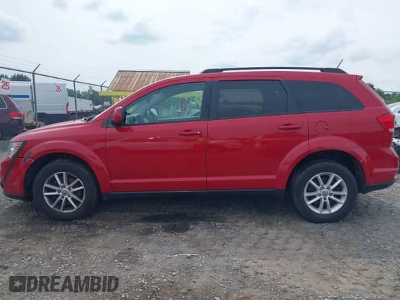 2017 Dodge Journey SXT with VIN 3C4PDDBG0HT574116, listed as a IAAI auction lot 42701428 with 77,246 mi miles and . Bid and sale history available at DreamBid. Image 14.