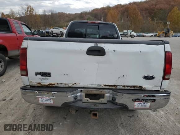 2002 Ford F-150 XL с VIN 1FTRF18W92NB71226, выставлен на аукционе Copart как лот 76082214 с пробегом Не указан миль и Списание • Salvage title. История ставок и продаж доступна на DreamBid. Изображение 6.