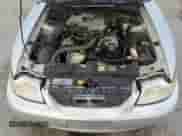 2003 Ford Mustang Standard z VIN 1FAFP40493F313569, wystawiony jako Copart lot #82765965 z przebiegiem 117 835 mil mil oraz Czysty tytuł • Clean title. Historia ofert i sprzedaży dostępna na DreamBid. Obrazek 11.