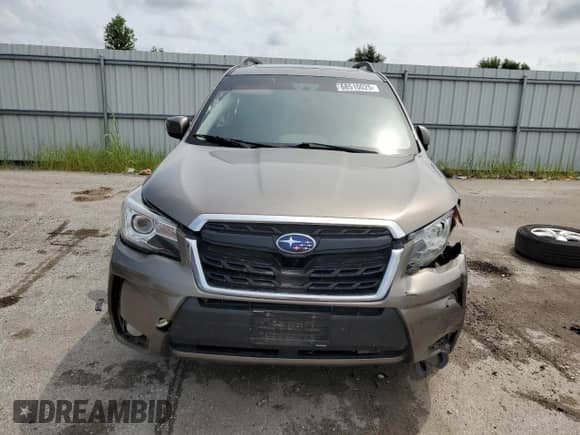 2017 Subaru Forester Touring z VIN JF2SJGWC1HH557983, wystawiony jako Copart lot #68510025 z przebiegiem 122 654 mil mil oraz Szkoda całkowita • Salvage title. Historia ofert i sprzedaży dostępna na DreamBid. Obrazek 5.