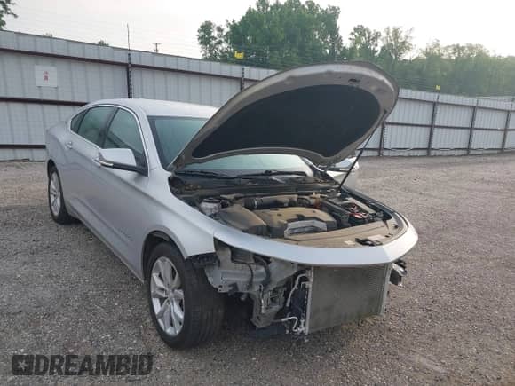 2018 Chevrolet Impala LT z VIN 1G1105SA8JU143854, wystawiony jako IAAI lot #42113667 z przebiegiem 82 799 mil mil oraz . Historia ofert i sprzedaży dostępna na DreamBid. Obrazek 20.