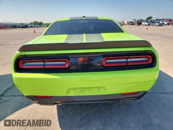 2023 Dodge Challenger SXT with VIN 2C3CDZAG3PH554144, listed as a Copart auction lot 70311265 with 55,494 mi miles and Salvage title. Bid and sale history available at DreamBid. Image 6.