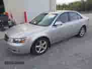 2007 Hyundai Sonata SE z VIN 5NPEU46F67H235819, wystawiony jako IAAI lot #43156430 z przebiegiem 264 320 mil mil oraz . Historia ofert i sprzedaży dostępna na DreamBid. Obrazek 2.
