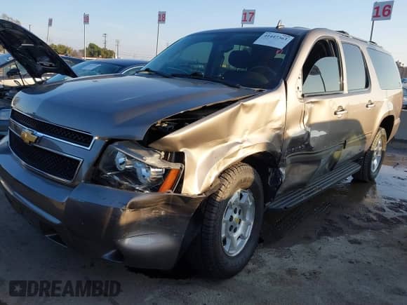 2012 Chevrolet Suburban LS с VIN 1GNSCHE0XCR143178, выставлен на аукционе IAAI как лот 41447363 с пробегом 96 197 миль миль и . История ставок и продаж доступна на DreamBid. Изображение 2.