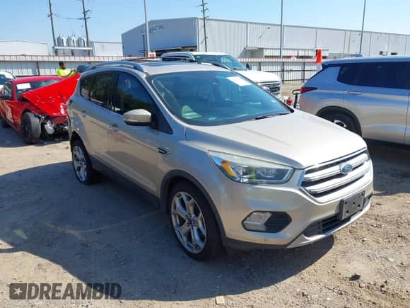 2017 Ford Escape Titanium with VIN 1FMCU0J92HUE93355, listed as a IAAI auction lot 43131180 with 88,235 mi miles and . Bid and sale history available at DreamBid. Image 1.