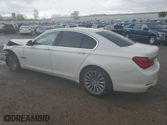 2012 BMW 7 Series 750i xDrive with VIN WBAKC6C54CC396671, listed as a Copart auction lot 55797715 with 90,446 mi miles and Salvage title. Bid and sale history available at DreamBid. Image 2.