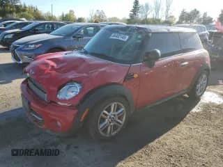 2013 MINI Hardtop with VIN WMWSU3C55DT677925, listed as a Copart auction lot 84402145 with 100,521 mi miles and Salvage title. Bid and sale history available at DreamBid. Image 1.