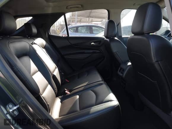 2018 Chevrolet Equinox Premier with VIN 2GNAXMEV0J6100403, listed as a IAAI auction lot 43366412 with 65,799 mi miles and . Bid and sale history available at DreamBid. Image 8.