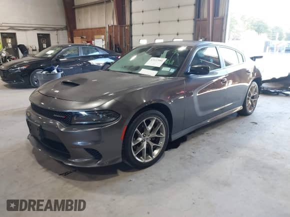 2023 Dodge Charger GT z VIN 2C3CDXHG1PH579408, wystawiony jako IAAI lot #43337986 z przebiegiem 66 952 mil mil oraz . Historia ofert i sprzedaży dostępna na DreamBid. Obrazek 2.