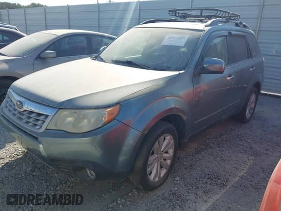 2012 Subaru Forester X Limited z VIN JF2SHBEC0CH420297, wystawiony jako IAAI lot #43180001 z przebiegiem 170 820 mil mil oraz . Historia ofert i sprzedaży dostępna na DreamBid. Obrazek 2.