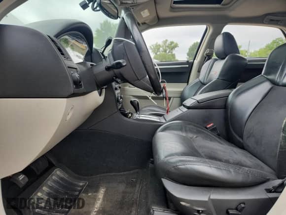 2007 Chrysler 300 C SRT-8 with VIN 2C3LA73W17H617839, listed as a Copart auction lot 60858475 with 180,655 mi miles and Salvage title. Bid and sale history available at DreamBid. Image 7.