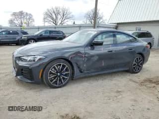 2025 BMW i4 xDrive40 with VIN WBY43HD01SFU42446, listed as a Copart auction lot 50085775 with 1,659 mi miles and Salvage title. Bid and sale history available at DreamBid. Image 1.