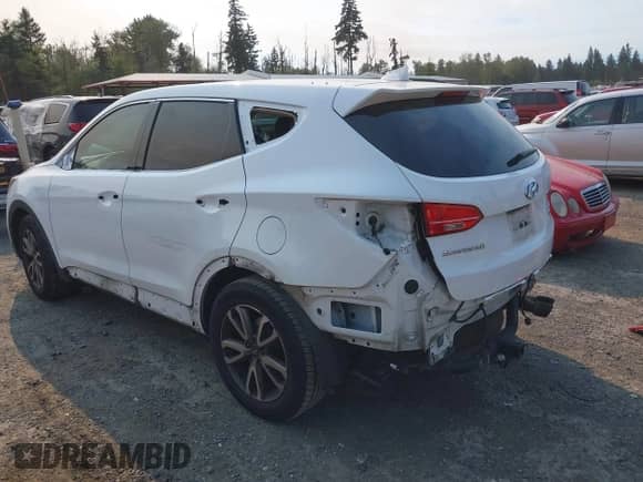2014 Hyundai Santa Fe z VIN 5XYZU3LA3EG126890, wystawiony jako IAAI lot #42974858 z przebiegiem 103 129 mil mil oraz . Historia ofert i sprzedaży dostępna na DreamBid. Obrazek 3.