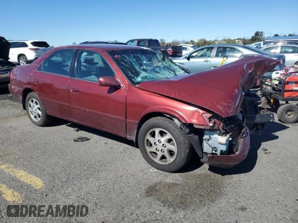 2000 Toyota Camry LE с VIN 4T1BF22KXYU100222, выставлен на аукционе Copart как лот 86111955 с пробегом Не указан миль и Списание • Salvage title. История ставок и продаж доступна на DreamBid. Изображение 4.