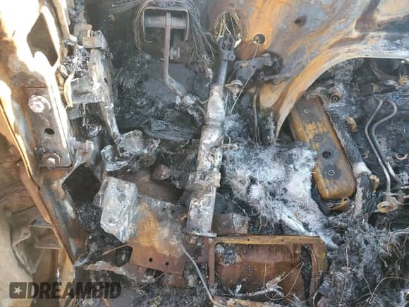 1996 Chevrolet Chevy Van с VIN 1GBFG15R0T1011277, выставлен на аукционе Copart как лот 51970455 с пробегом Не указан миль и На запчасти • Non repairable. История ставок и продаж доступна на DreamBid. Изображение 9.