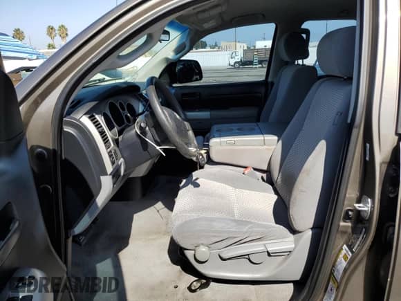 2008 Toyota Tundra with VIN 5TFRT54118X026883, listed as a Copart auction lot 82267115 with 291,654 mi miles and Salvage title. Bid and sale history available at DreamBid. Image 7.