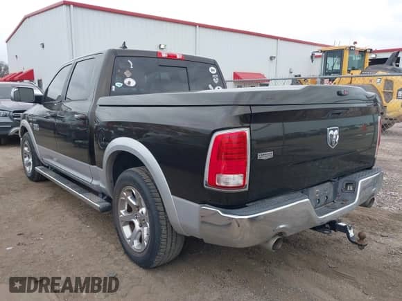 2013 Ram 1500 Laramie with VIN 1C6RR6NT5DS697668, listed as a IAAI auction lot 41501112 with 146,001 mi miles and . Bid and sale history available at DreamBid. Image 3.