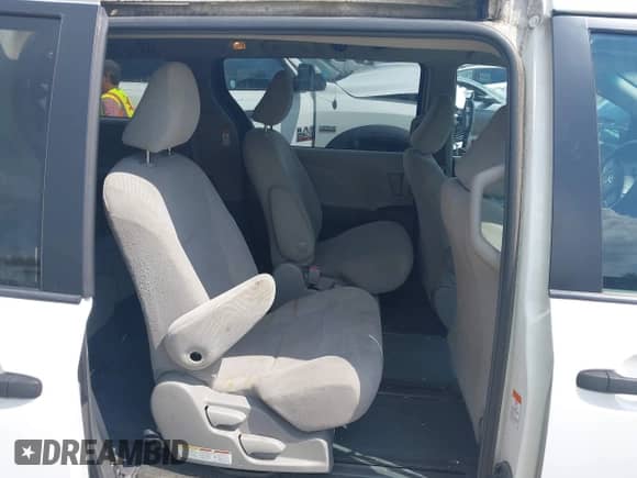 2016 Toyota Sienna L with VIN 5TDZK3DC6GS731823, listed as a IAAI auction lot 42969814 with 173,921 mi miles and . Bid and sale history available at DreamBid. Image 8.