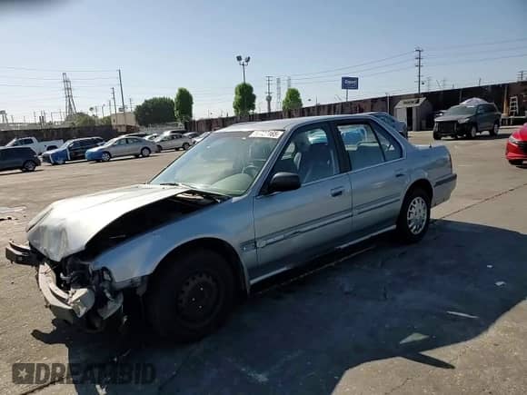 1990 Honda Accord LX with VIN JHMCB7652LC076386, listed as a Copart auction lot 57727165 with 245,375 mi miles and Salvage title. Bid and sale history available at DreamBid. Image 13.