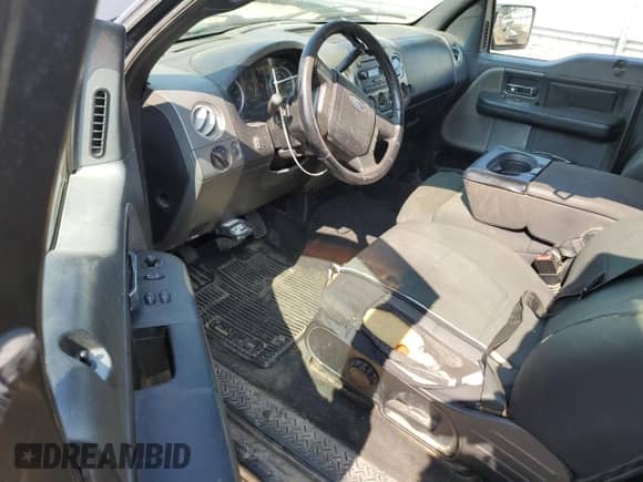 2005 Ford F-150 XL with VIN 1FTRF14575NA15476, listed as a Copart auction lot 65002405 with 270,312 mi miles and Clean title. Bid and sale history available at DreamBid. Image 8.