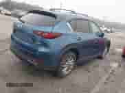 2023 Mazda CX-5 S Carbon Edition z VIN JM3KFBCM0P0195827, wystawiony jako IAAI lot #42905023 z przebiegiem 31 766 mil mil oraz . Historia ofert i sprzedaży dostępna na DreamBid. Obrazek 4.