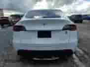 2021 Tesla Model Y Long Range with VIN 5YJYGDEE8MF092993, listed as a Copart auction lot 81125165 with 47,072 mi miles and Non repairable. Bid and sale history available at DreamBid. Image 6.