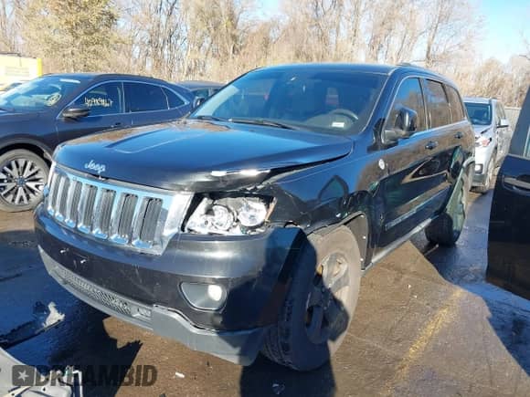 2011 Jeep Grand Cherokee 70th Anniversary z VIN 1J4RR4GT8BC504618, wystawiony jako IAAI lot #40993960 z przebiegiem 188 098 mil mil oraz . Historia ofert i sprzedaży dostępna na DreamBid. Obrazek 2.