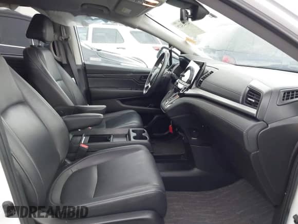 2023 Honda Odyssey EX-L with VIN 5FNRL6H6XPB055979, listed as a IAAI auction lot 42443479 with 61,873 mi miles and . Bid and sale history available at DreamBid. Image 5.