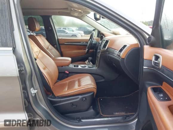 2012 Jeep Grand Cherokee Overland z VIN 1C4RJECG5CC129669, wystawiony jako IAAI lot #42462450 z przebiegiem 178 180 mil mil oraz . Historia ofert i sprzedaży dostępna na DreamBid. Obrazek 5.