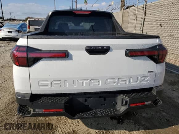 2024 Hyundai Santa Cruz SEL с VIN 5NTJBDDE5RH119014, выставлен на аукционе Copart как лот 74174244 с пробегом 2 912 миль миль и Списание • Salvage title. История ставок и продаж доступна на DreamBid. Изображение 6.