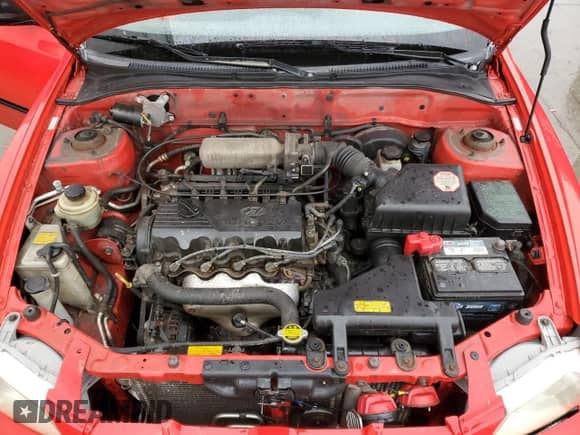 2000 Hyundai Accent z VIN KMHCF35G2YU013092, wystawiony jako Copart lot #86220124 z przebiegiem 153 844 mil mil oraz Szkoda całkowita • Salvage title. Historia ofert i sprzedaży dostępna na DreamBid. Obrazek 11.