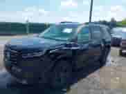 2025 Honda Pilot TrailSport with VIN 5FNYG1H63SB029218, listed as a IAAI auction lot 42671510 with 31,583 mi miles and . Bid and sale history available at DreamBid. Image 2.