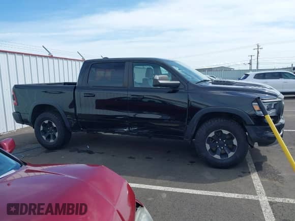 2019 Ram 1500 Rebel с VIN 1C6SRFLT2KN592652, выставлен на аукционе IAAI как лот 41989054 с пробегом 71 630 миль миль и . История ставок и продаж доступна на DreamBid. Изображение 13.