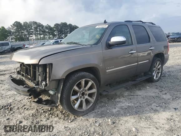 2012 Chevrolet Tahoe LTZ с VIN 1GNSCCE0XCR110507, выставлен на аукционе Copart как лот 54269535 с пробегом 193 499 миль миль и Списание • Salvage title. История ставок и продаж доступна на DreamBid. Изображение 1.