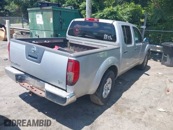 2009 Nissan Frontier SE with VIN 1N6AD07U59C407404, listed as a IAAI auction lot 42772182 with 183,640 mi miles and . Bid and sale history available at DreamBid. Image 4.
