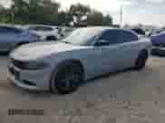 2020 Dodge Charger SXT с VIN 2C3CDXBG1LH241283, выставлен на аукционе Copart как лот 71236575 с пробегом 326 856 миль миль и Списание • Salvage title. История ставок и продаж доступна на DreamBid. Изображение 1.