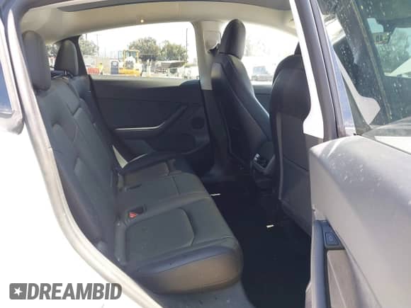 2022 Tesla Model Y Long Range z VIN 7SAYGDEE3NF413701, wystawiony jako IAAI lot #43045999 z przebiegiem 17 042 mil mil oraz . Historia ofert i sprzedaży dostępna na DreamBid. Obrazek 8.