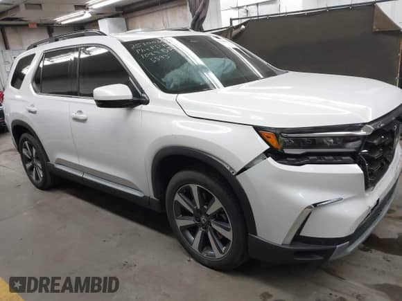 2025 Honda Pilot Touring с VIN 5FNYG1H70SB085593, выставлен на аукционе IAAI как лот 43408593 с пробегом Не указан миль и . История ставок и продаж доступна на DreamBid. Изображение 13.